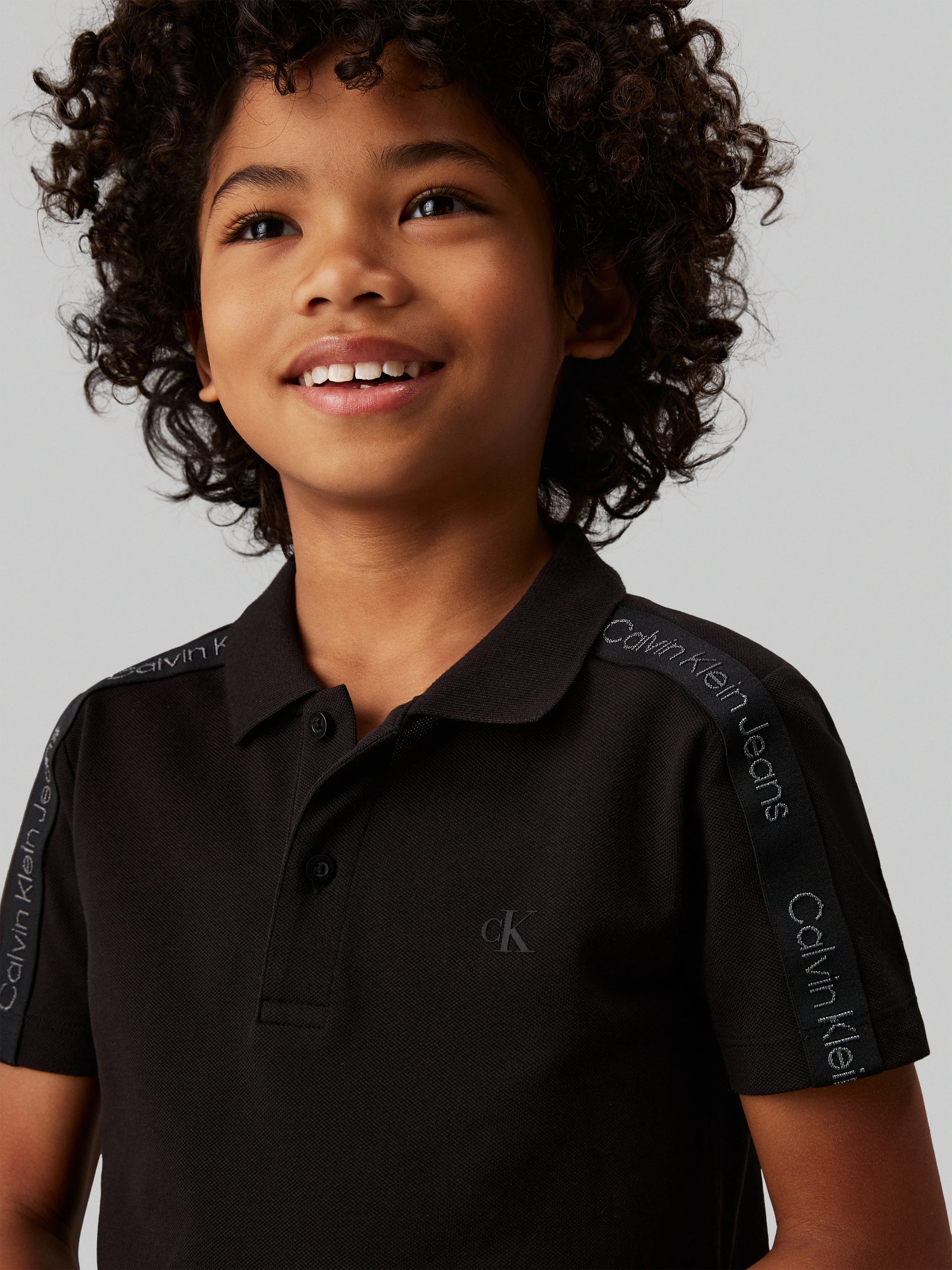 Calvin Klein Boys Slim Fit Polo Shirt in Black