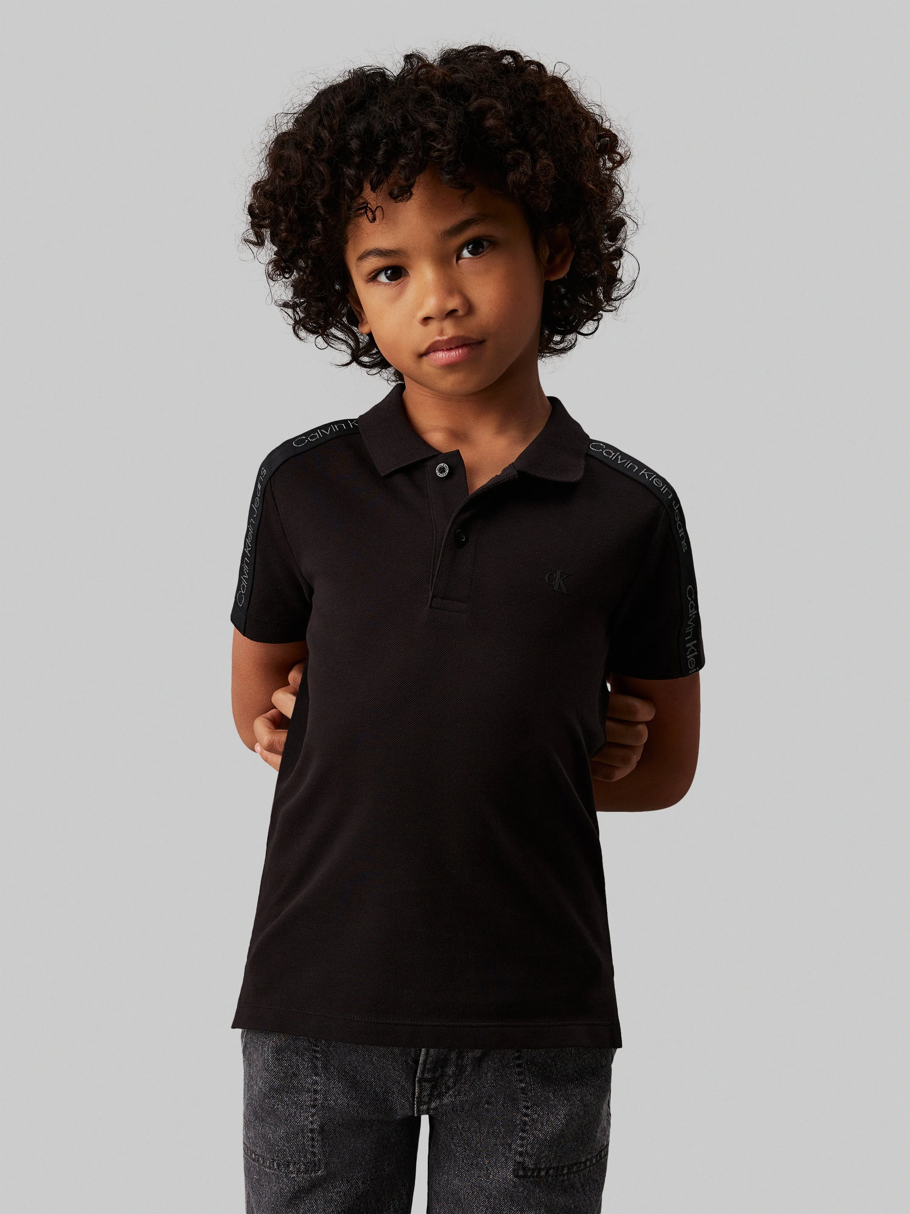 Calvin Klein Boys Slim Fit Polo Shirt in Black